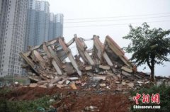 澳门金沙赌场_澳门金沙网址_澳门金沙网站_北京修订通过城乡规划条例 当事人承担强拆违建